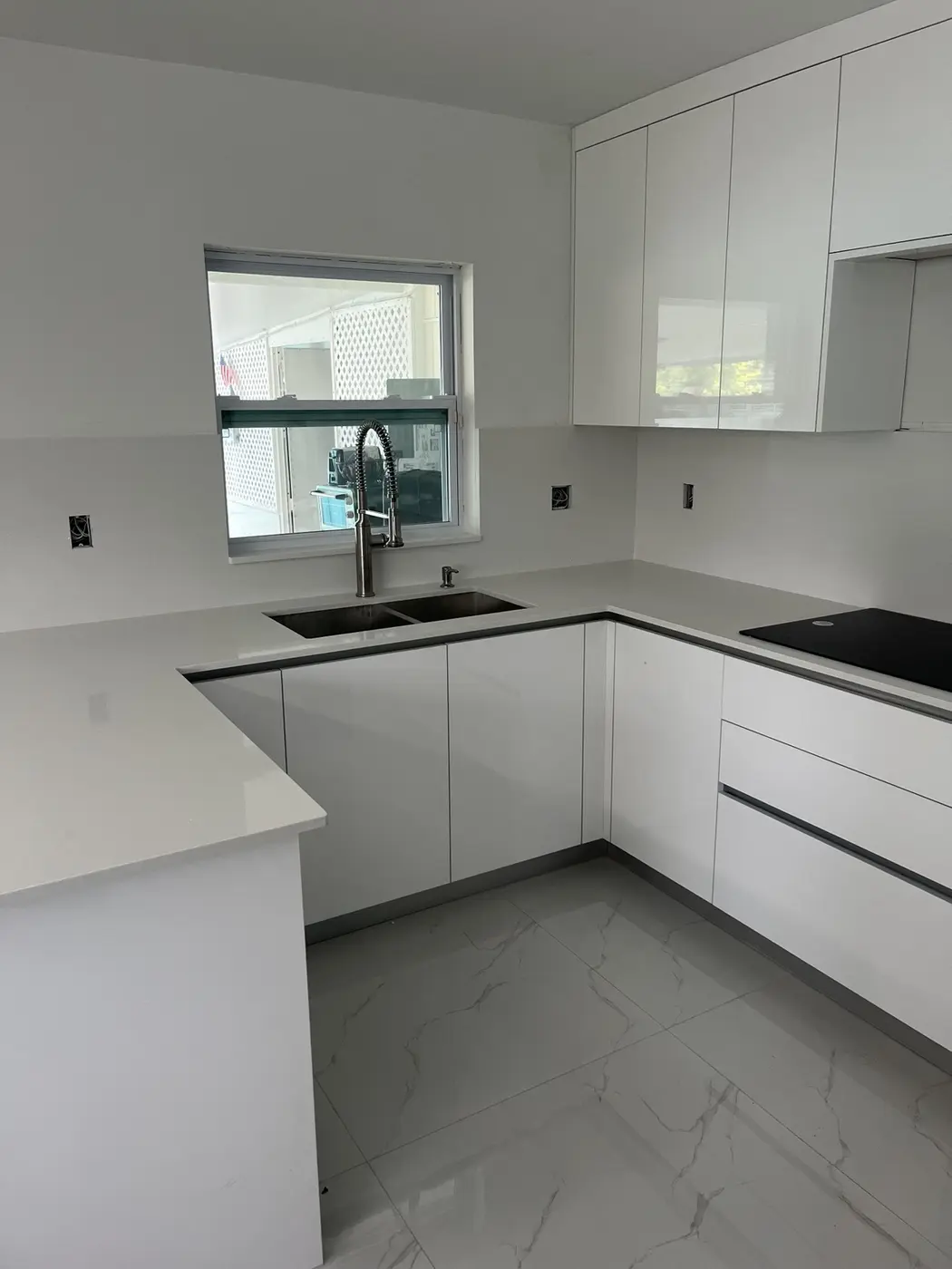 Bright white quartz countertop installation
